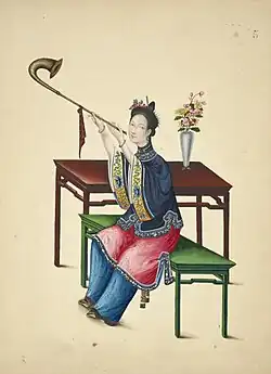 Woman playing a haotou.