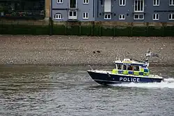 London Metropolitan Police boat John Harriott IV on the Thames