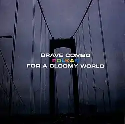 A black-and-white dreary photo of a city bridge, with the text 'Brave Combo' and 'Polkas for a Gloomy World'. The text is all white except for the word "polkas," which is colorful.