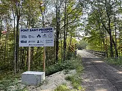 Former railway line (CN)[14] converted to the Trans Canada Trail,[15] Saint-Prosper-de-Champlain Bridge, over Cossette Creek
