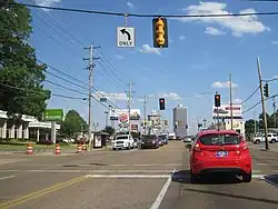 Poplar Avenue, a major road through East Memphis, runs by prominent buildings including White Station Tower (rear left) and Clark Tower (rear right).