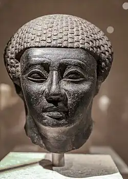 Portrait head of an Egyptian from Thebes; circa 2000 BC; granite; Egyptian Museum of Berlin (Germany)