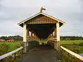 Poukkasilta, a covered bridge over the Loimijoki River in Ypäjä, Finland.