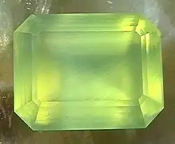 Emerald cut prehnite, 1.85 cm × 1.42 cm, 4.6 grams.