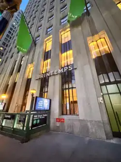 Printemps New York building featuring a subway entrance