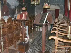 Eastern Orthodox choir stalls (kathisma) on the kliros (area for the choir) with analogia (lecterns) for liturgical books
