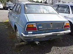 The rear view of a Toyota Publica Starlet Sedan