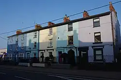 Row of colourful town houses on Queen's Avenue, Bicester