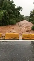 Río Culebrinas from bridge between Magos barrio and Calabazas barrio after heavy rains