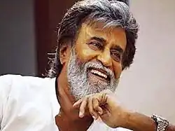 Rajinikanth is seen looking away from the camera.