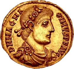 Golden coin depicting man with diadem facing right