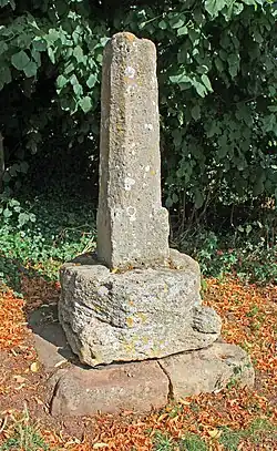 Cross 15 m north of St Peter's Church