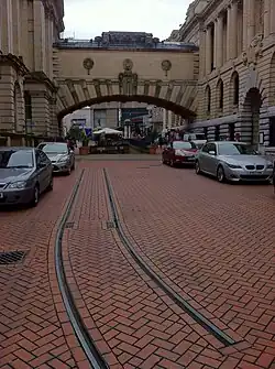 Remains of tram track in Edmund Street, Birmingham, with modern block paving