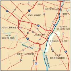 Map shows Albany on the west bank of the Hudson, surrounded by the towns of Colonie, Guilderland, and Bethlehem. Roads are also shown. Interstates 90, 87, and 787 pass through the city boundaries.
