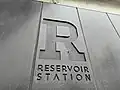 The built in wall station signage feature at Reservoir, July 2024