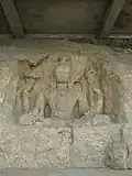 The rock-cut sculpture representing Vishnu (with adjoining figures of Surya, Ganesa, Devi etc locally Known as Vishnu Janardhan