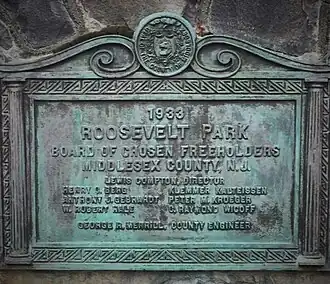 Roosevelt Park stone monument, plaque on back