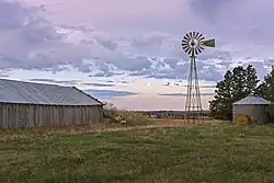 Rural buildings and windmill in Meadow Township