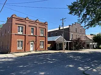Rushville Hotel and Theater - Both built c.1910s The Rushville Theater (on right) features an auditorium on the second floor with a storefront on the ground floor. The Rushville Hotel (on left) now serves as an apartment building.
