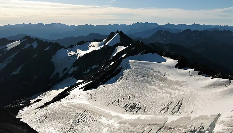 Ruth Peak and Fairchild Glacier seen from Mount Carrie