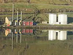 Vágsverkið of SEV produces electricity. It is located on the south side of Vágsfjørður.