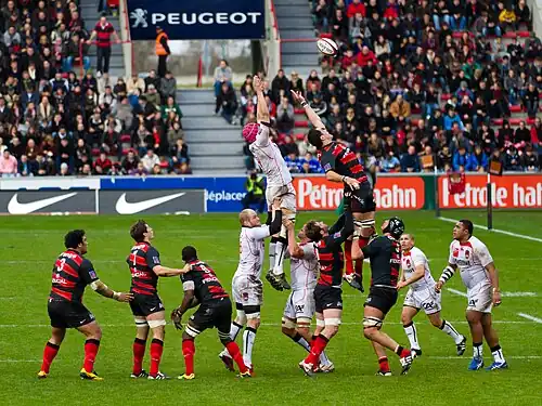 Image 11 Line-out Photograph: Pierre Selim A line-out at a rugby union match between Stade Toulousain and Lyon OU. When a player puts the ball out of the field of play, the opposing team is awarded a line-out; in the case of a penalty kick, the team that was awarded the penalty throws into the resulting line-out. A line-out is also awarded if a player in possession of the ball crosses or touches the touch-line while still in possession of the ball. More selected pictures