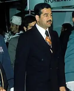 Saddam praying at the Imam Reza Shrine – 1976