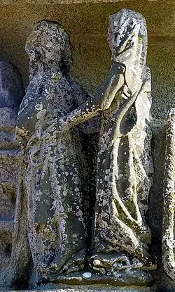 The visitation: Elizabeth, told by Mary of her pregnancy, touches Mary's stomach.