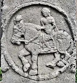 Foreigner on a horse. The medallions are dated circa 115 BC.[187]