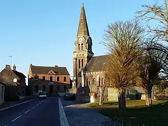 The town hall and church in Sancourt