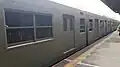 PNR EMU 04/01 in primer gray livery at Santa Mesa station (March 2022)