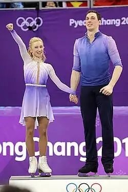 Aljona Savchenko and Bruno Massot on the podium at the 2018 Winter Olympics