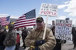 Man carrying placard