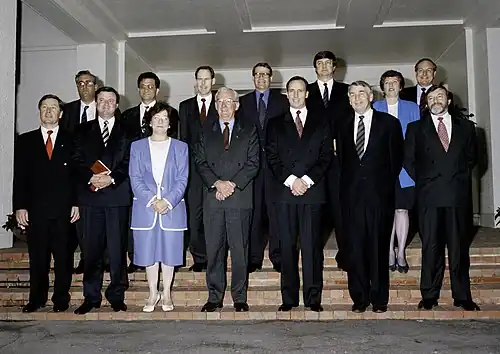 Governor-General Bill Hayden, representing Elizabeth II, Queen of Australia, with his Cabinet, a subcommittee of the Federal Executive Council, outside Government House, 25 March 1994