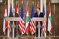 Lebanese Prime Minister Saad Hariri and U.S. Secretary of State Rex Tillerson standing at podiums during a joint press conference at the Grand Serail in Beirut on February 15, 2018.