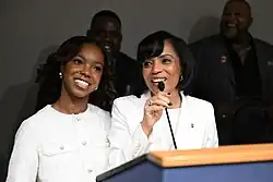 Angela Alsobrooks standing next to her daughter