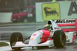 Senna driving on a track in rainy conditions