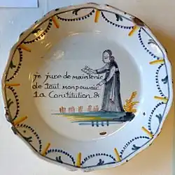 A priest swears "with all my power" to maintain the Constitution; the clergy were made to so swear ("je jure de maintenir de tout mon pouvoir la constitution") in November 1790