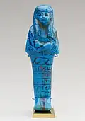 Shabti of Paser, the vizier of Seti I and Ramesses II; 1294–1213 BC; faience; height: 15 cm, width: 4.9 cm; Metropolitan Museum of Art (New York City)