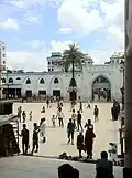 Main plaza with the dargah gate in the background