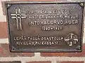 A sign for the burial place of Into Auer [fi]