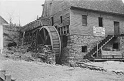 Gristmill with overshot water wheel, Skyline Drive, Virginia, 1938