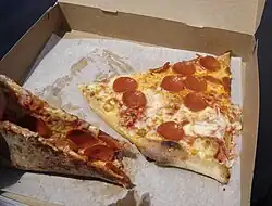 New York–style pepperoni pizza, displaying its characteristic thin foldable crust