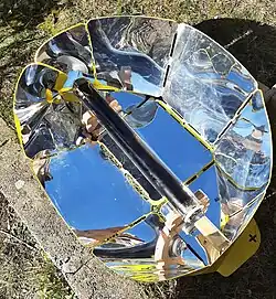 Solar cooker with evacuated glass tube