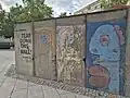 The back of the monument, featuring the fragments of the Berlin Wall.