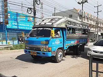 Image 110Medium-sized Isuzu Songthaew (truck bus) as seen in Samut Sakhon, Thailand. (from Combination bus)