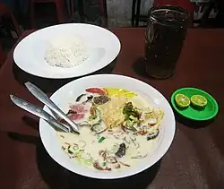 Soto betawi, a Betawi beef meat and offals in rich and creamy milk or coconut milk soup.