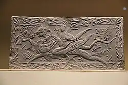 An immortal riding on a dragon, Dengzhou painted stone-relief [zh], Liu Song dynasty.