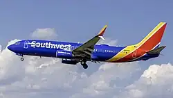 Logo (2014–present), consisting of the name "Southwest" in blue letters followed by a heart in yellow, red and blue diagonal stripes