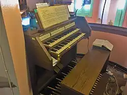The current Viscount electric organ in the choir loft